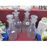 Four Glass Decanters, with ring handles.