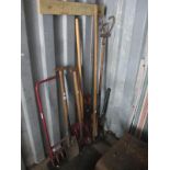 A Snow Shovel, Rake, fork, other tools.