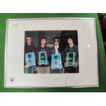 Oasis Signed (Unverified) Framed and Mounted Photograph, measuring 240mm x 190mm.