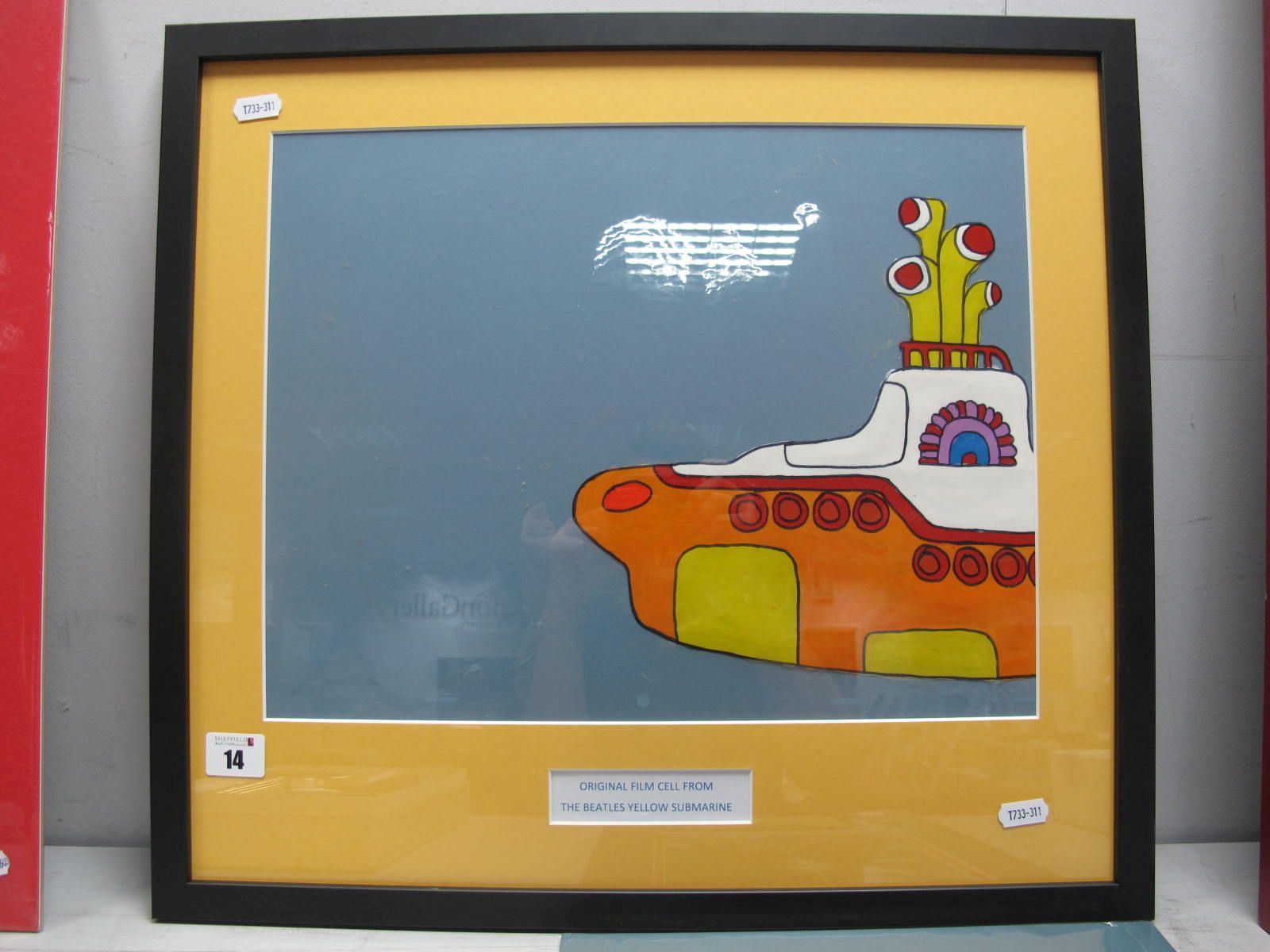 The Beatles - Yellow Submarine Film Cell, framed and mounted, measuring 400mm x 300mm.