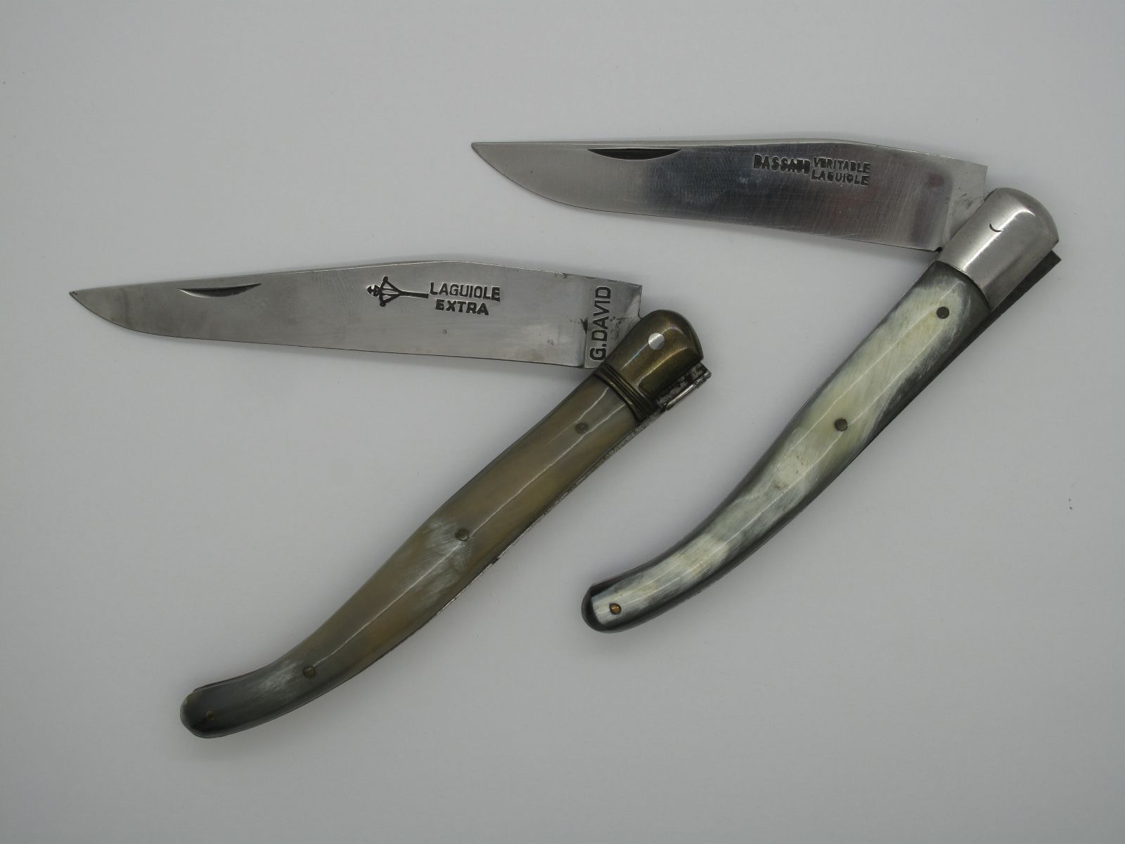 Pocket Knife by Laguiole, with polished horn scales, brass bolster, spring work backed and