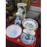 Oriental Blue and White Posy, on triform feet, fitting snugly on to a circular base, ovoid and