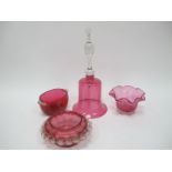 A Cranberry Glass Bell, 33cm high, three other pieces with clear frills. (4)