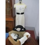A WWII Period Nurses Uniform, complete with hats, belt, badges, all pertaining to the St John's