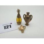 A 9ct Gold Novelty Charm Pendant, as a twin handled vase; together with a 9ct gold tea pot charm