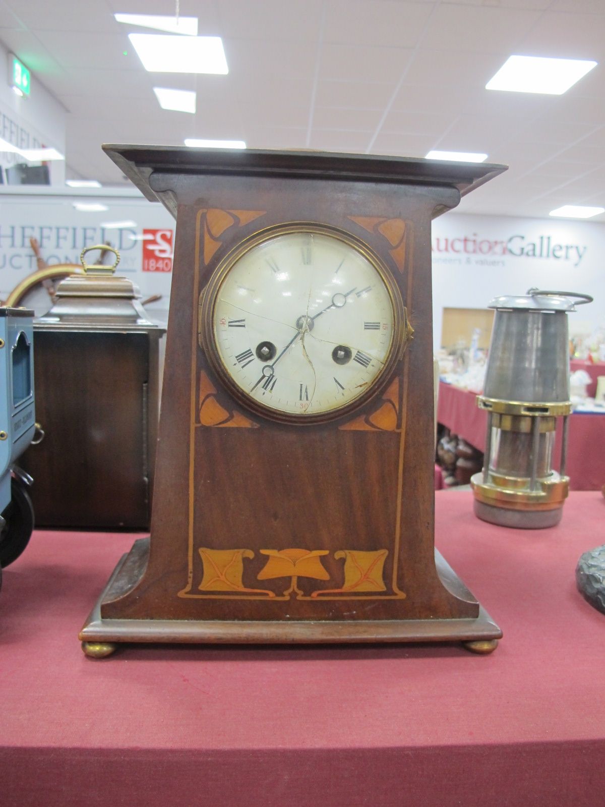 D.C Co Art Nouveau Mantle Clock, having inlaid mahogany case, on four brass bun feet, (glass