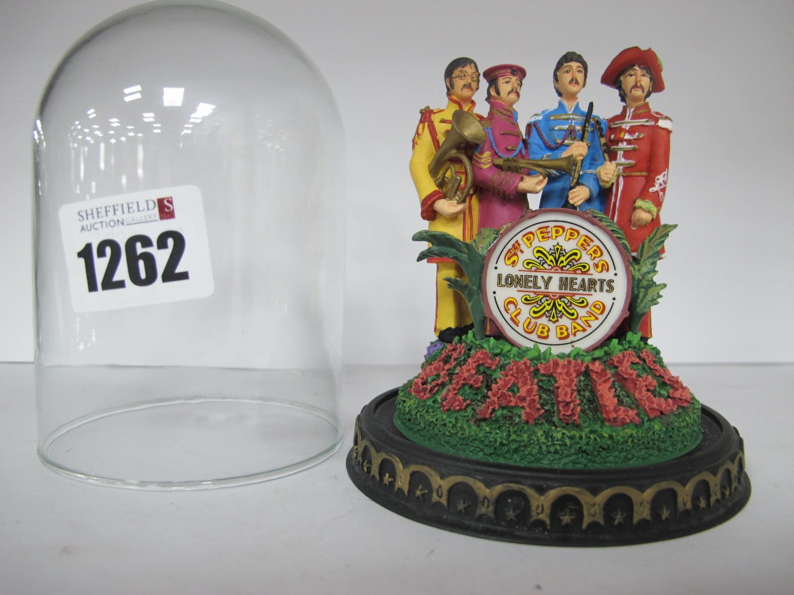 The Beatles Franklin Mint 'Sgt Peppers Lonely Hearts Club Band' Model, under glass dome 11cm high