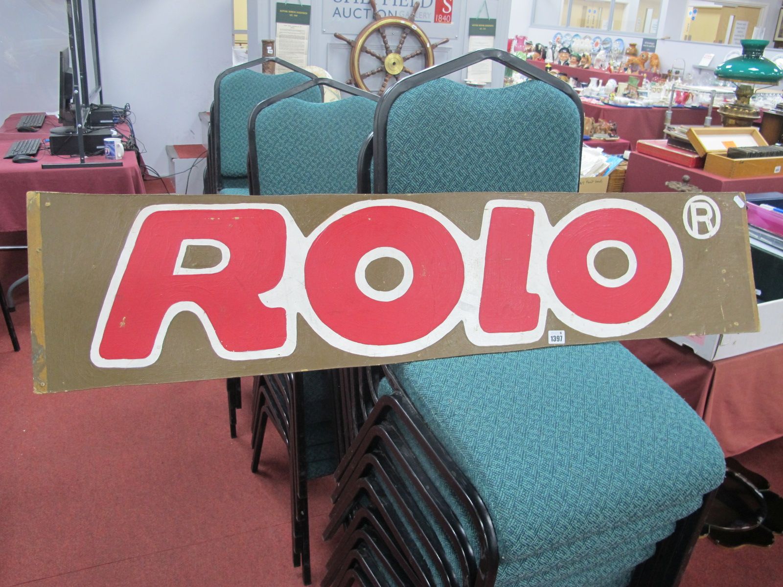 A Mid XX Century Hand Painted Fairground Style Sign for Rolo (Chocolates), 26.5 x 122cm.