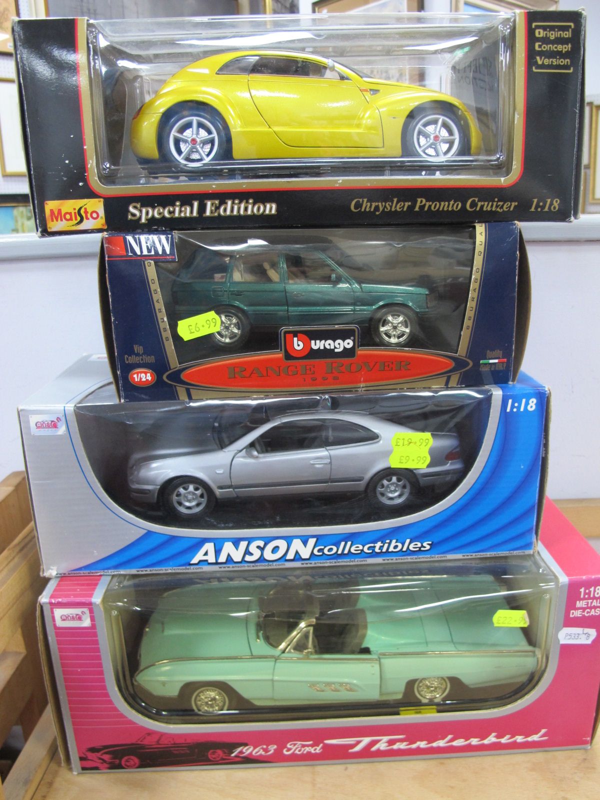 Four Large Display Diecast Vehicles, to include 1/24 Burago, Range Rover, Anson 1/8 Ford