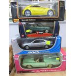 Four Large Display Diecast Vehicles, to include 1/24 Burago, Range Rover, Anson 1/8 Ford