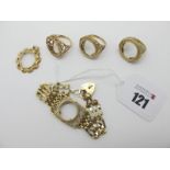 Three 9ct Gold Coin Ring Mounts, (lacking coins); a coin pendant mount stamped "375" and a 9ct