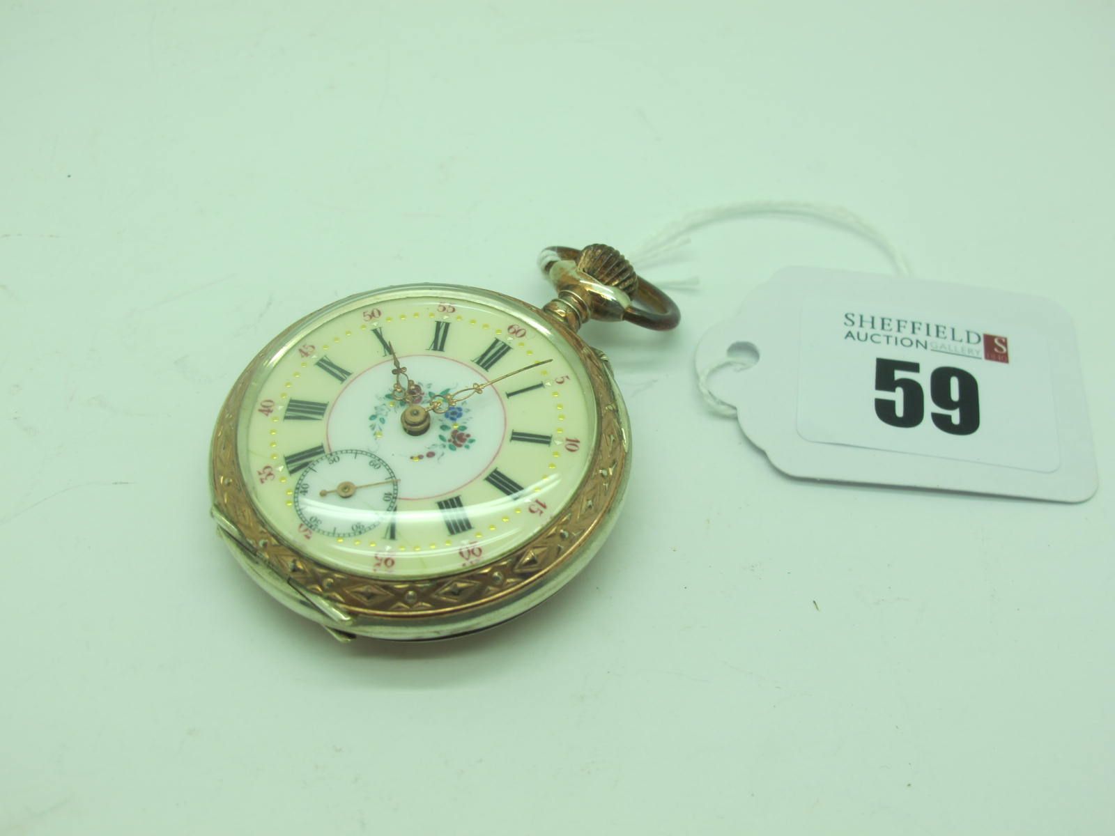 A Highly Decorative German Openface Pocketwatch, the cream and white dial with foliate highlights,