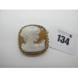 A Modern 9ct Gold Cushion Shape Carved Cameo Brooch, depicting female profile, collet set within