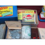 A Quantity of Bayko, to include loose items in a '2X' box, plus further parts and plans.