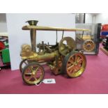 A Wilesco All Brass Finish Live Steam Traction Engine, with burner, rubber tyres and a home