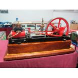 A Horizontal Steam Engine, length 12 inches, 7 inch diameter flywheel, 2 inch stroke, finished in