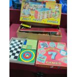 A Boxed Mettoy Playthings Metal Dolls House, with self opening garage (box has tears, unchecked