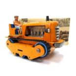 An Interesting, boxed Funkstorgrad Tinplate, blue and orange liveried tractor with driver, box poor,