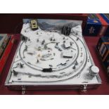 An 'N' Gauge "Snow Scene" Diarama Layout, 23" Square, 8" high; displaying various buildings,