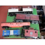 Five 'G' Gauge Unboxed Items of Rolling Stock, a Santa Fe Carboose and "Express Agency" van, four