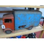 A Triang Tin Plate Transport Van No 20*, in red and light blue, (rusty) approximately 46cm long.