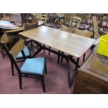 Dining Room Suite, rectangular teak table with an ebonised base, together with four ebonised chairs,