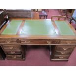 A XIX Century Style Hardwood Pedestal Desk, with a cross banded top, three green leather inserts,