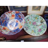 A Japanese Late XIX Century Imari Pattern Fluted Circular Bowl, painted with flowers, 24.5cm