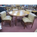 Teak Dining Room Suite, circa 1970's. comprising circular topped table with fold out leaf, and