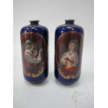 A Pair of Austrian Bottle Vases, circa 1900 featuring pipe smoker and lady holding lamp, each on