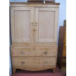 A XIX Century Pine Linen Press, with stepped pediment, shelves and open upper compartment over two