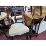 A 1920's Oak Gate Leg table, with drop leaves on barley twist and block supports, united by