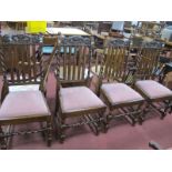 A Set of Four 1930's Oak Dining Chairs, with scroll and pierced top rails, drop in seats, on