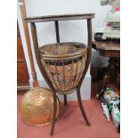 A Circular Sewing Table, having lower basket compartment, 73cm high. Coffee table with serpentine