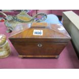 A XIX Century Mahogany Sarcophagus Tea Caddy, with lion brass ring handles, on gilded brass bun