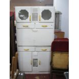 A Mid XX Century Kitchen Cabinet, with cupboard doors, fall front, over drawers and cupboards. (