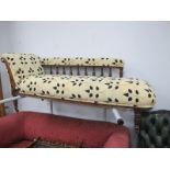 Early XX Century Walnut Framed Chaise Longue, with turned spindles to back, turned legs, re-