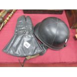 Waddington 1950's Black Leather Motorcycling Gloves, together with a black motorcycling helmet.