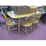 Ercol Style Rectangular Shaped Dining Table, together with six matching chairs, with hooped backs,