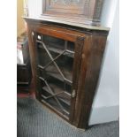 A XIX Century Mahogany Glazed Flat Fronted Corner Cupboard, with three internal shelves.