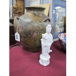 A Chinese Blanc De Chine Figure of Guanyin, 21cm high, and an ovoid vase with four handles and