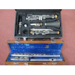 A Clarinet, four sectional, in case, Lark three sectional flute, in case. (2)