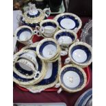 XIX Century Tea Ware in Blue Gilt and Cream, including sucrier stamped 7727, thirty one pieces, (