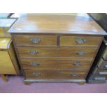 An XVIII Century Mahogany and Pine Chest of Drawers, the top with a moulded edge, two small drawers,