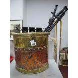 A XIX Century Copper and Brass Coal Bucket, companion set, clock and trivet stand.