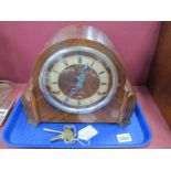 A 1930's Chiming Mantel Clock, the chapter ring with Roman numerals, within walnut veneered case,