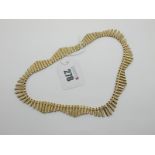 A 9ct Gold Fringe Style Necklace, of graduated textured design, 41cm long.