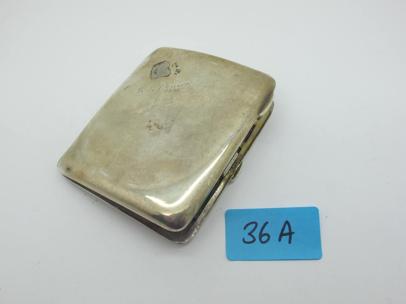 A Hallmarked Silver Cigarette Case, (dents) inscribed "RMS Orsova".