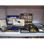 Assorted Cased Sets of Plated Cutlery, including fish knives and forks, tea knives, dessert spoons