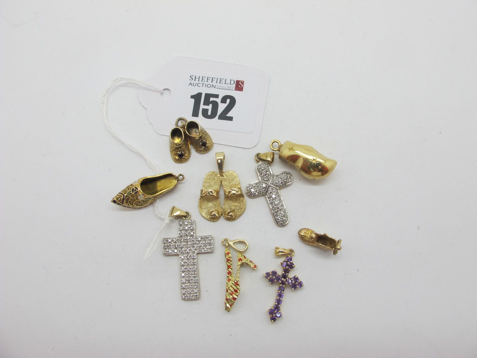 9ct Gold Cross Pendants, together with novelty shoe charm pendants.